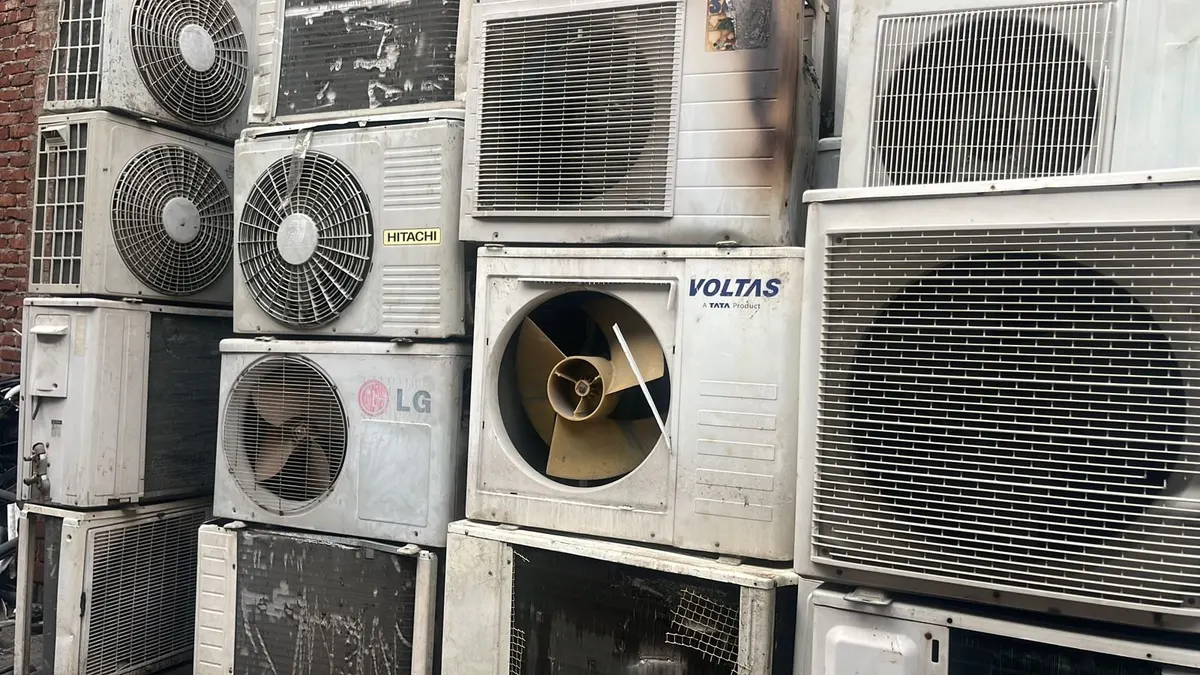 Stacked used AC outdoor units — HAQ TRADERS Hyderabad