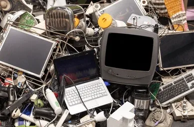 Monitors and laptops e-waste pile — HAQ TRADERS Hyderabad